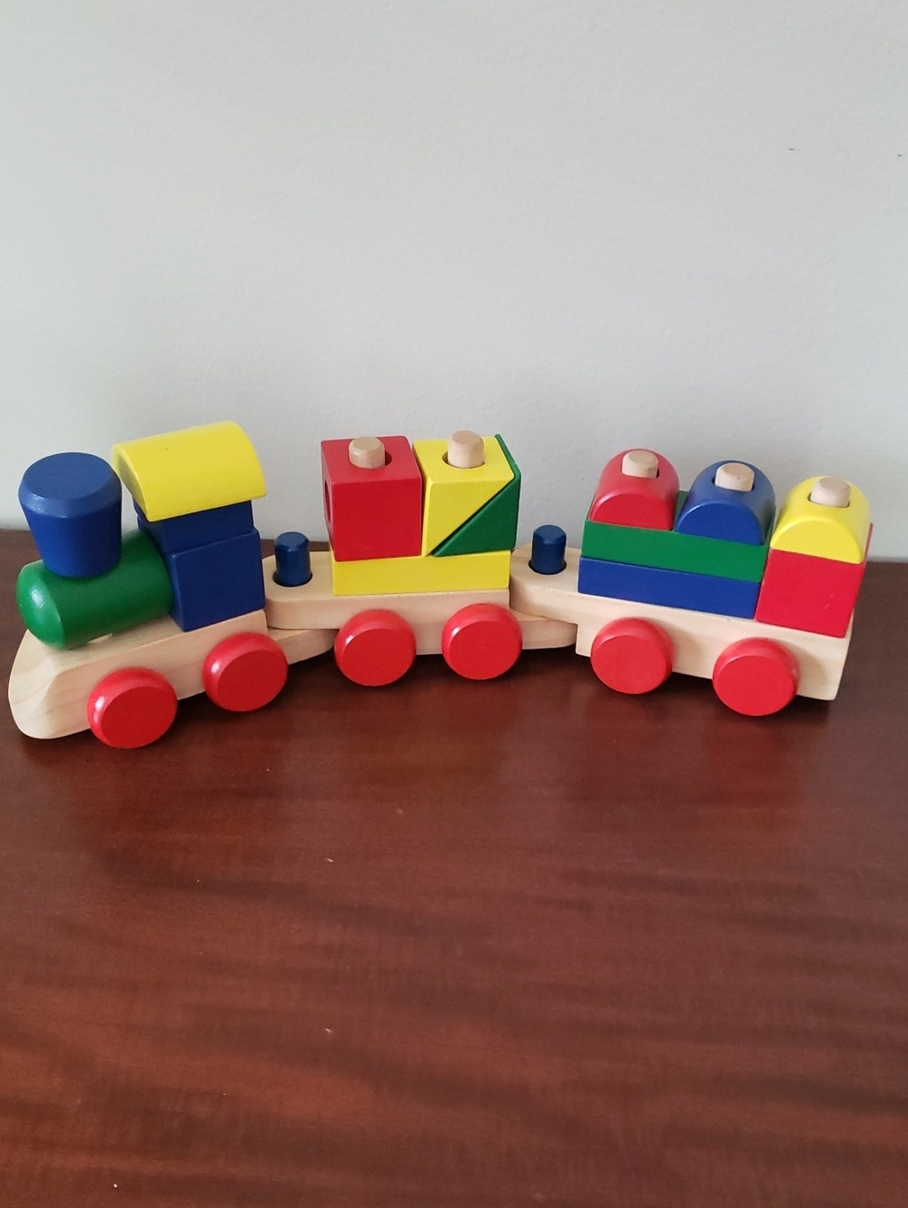 Melissa & Doug Classic Wooden Stacking  Train in Red Blue Yellow Green